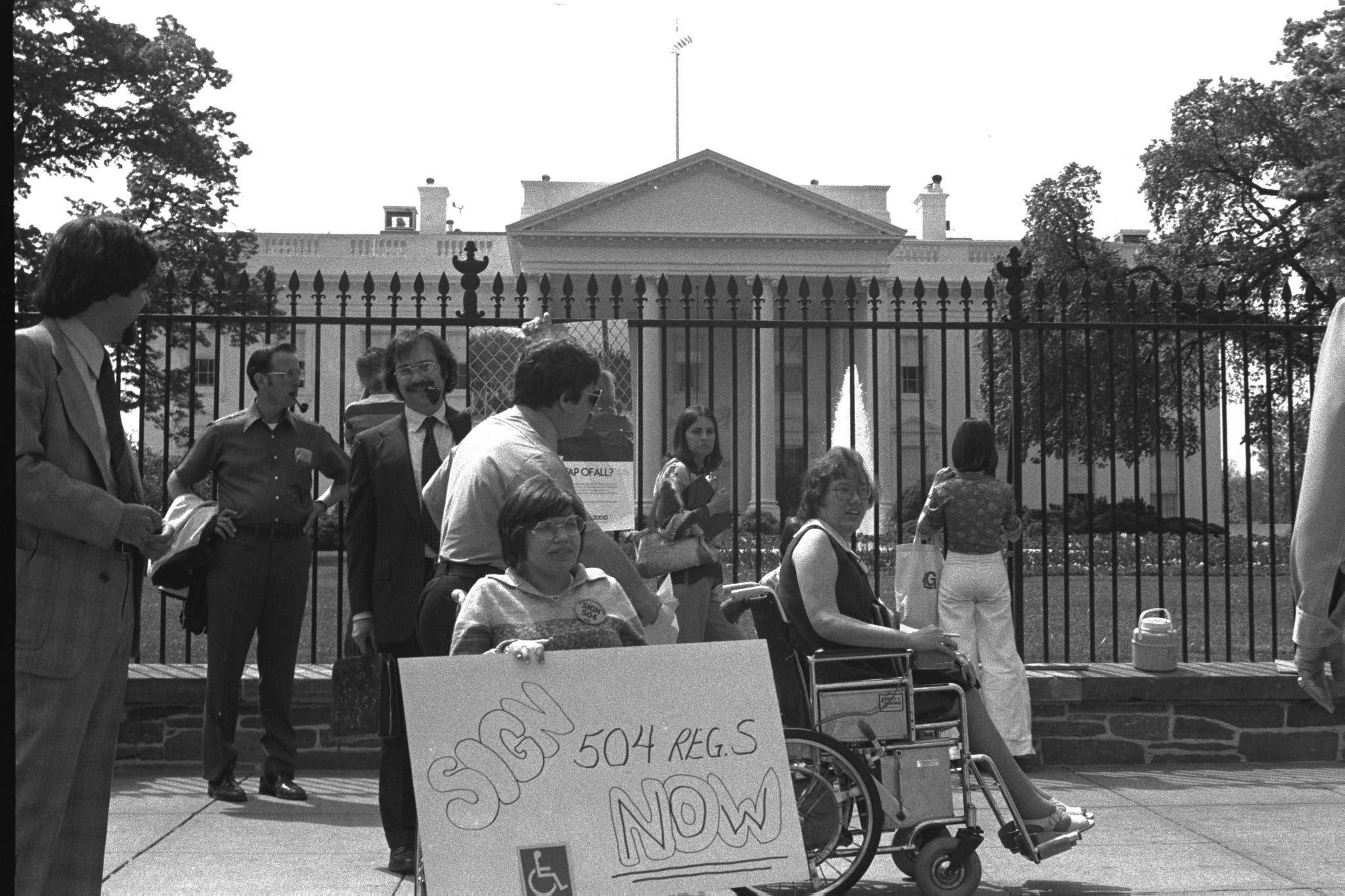 Disability rights advocates protesting in front of the White House.
