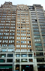 The Gothic-style, 24-story office building at 307 Seventh Avenue in New York City. 