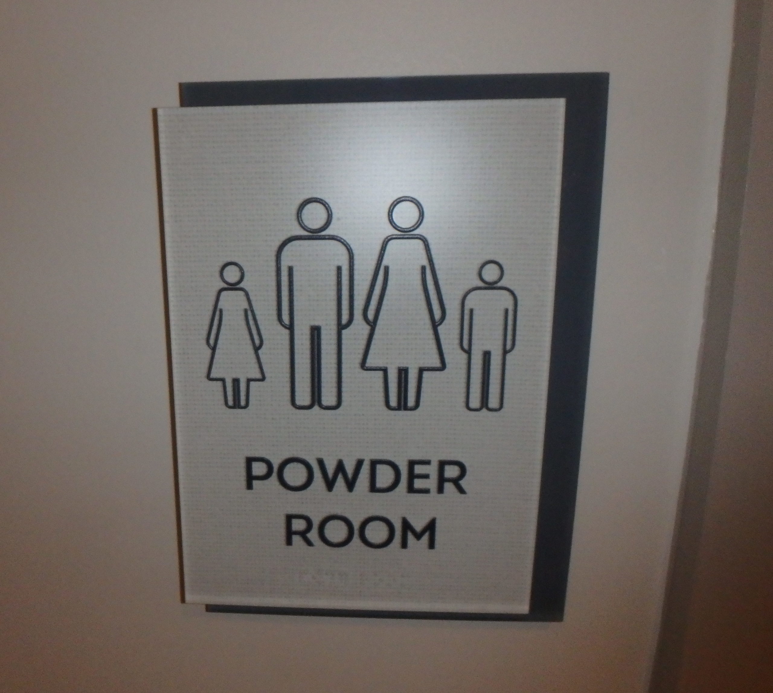 Accessible powder room sign.