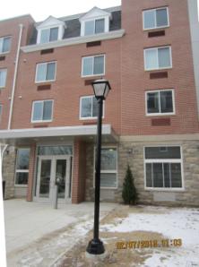 Multifamily apartment building using packaged terminal air conditioners (PTACs) as the source of make-up air for ventilation.