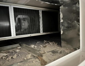 Duct air path running through a cavity full of dust and debris