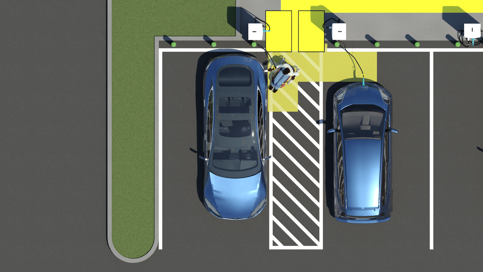Photo of two blue cars in a parking lot, one parked in a designated electric vehicle charging spot and connected to a charging station. A person stands beside the charging car. The lot includes marked spaces, a no-parking area with diagonal white lines, and green bollards near a grassy edge.