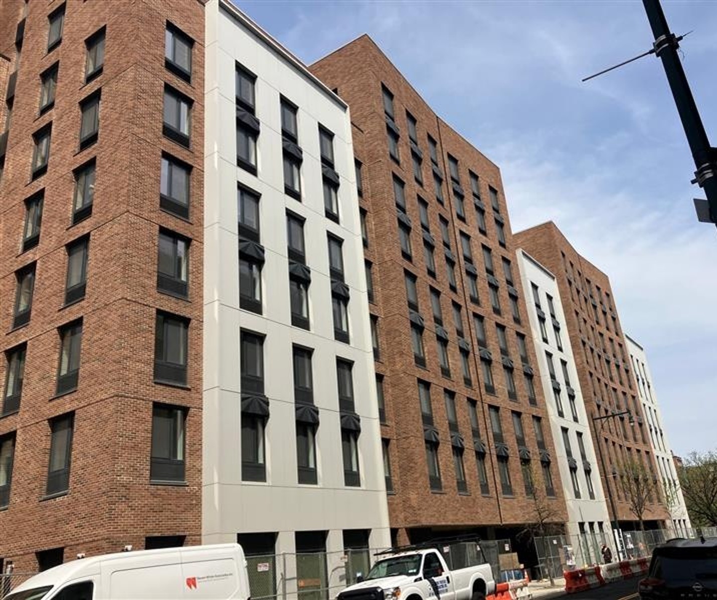 New multifamily Passive House building equipped with packaged terminal heat pumps designed for high-efficiency heating and cooling.