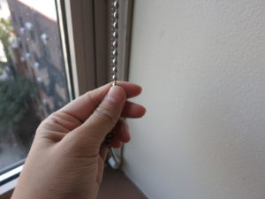 Beaded chain used to operate window shades.